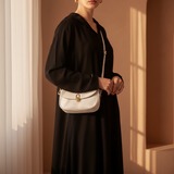 Awaan Cuir Blanc black djellaba standing pose