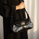 Layali Cuir Noir gold D-ring arch turnlock macro