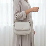 Najmat Cuir Beige grey djellaba standing pose