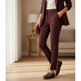 Woman in burgundy tailored suit with soft daylight wearing 490F Zahir Bordeaux loafers