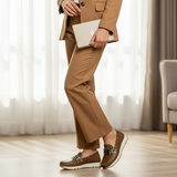 Woman in camel formal suit standing wearing 490F Zahir loafers