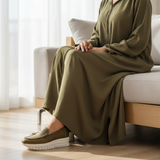 Woman in exact olive khaki djellaba with fully covered legs wearing L306F Lahn moccasins