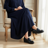 Woman in navy blue djellaba wearing 759F Glitsy moccasins - variation 1